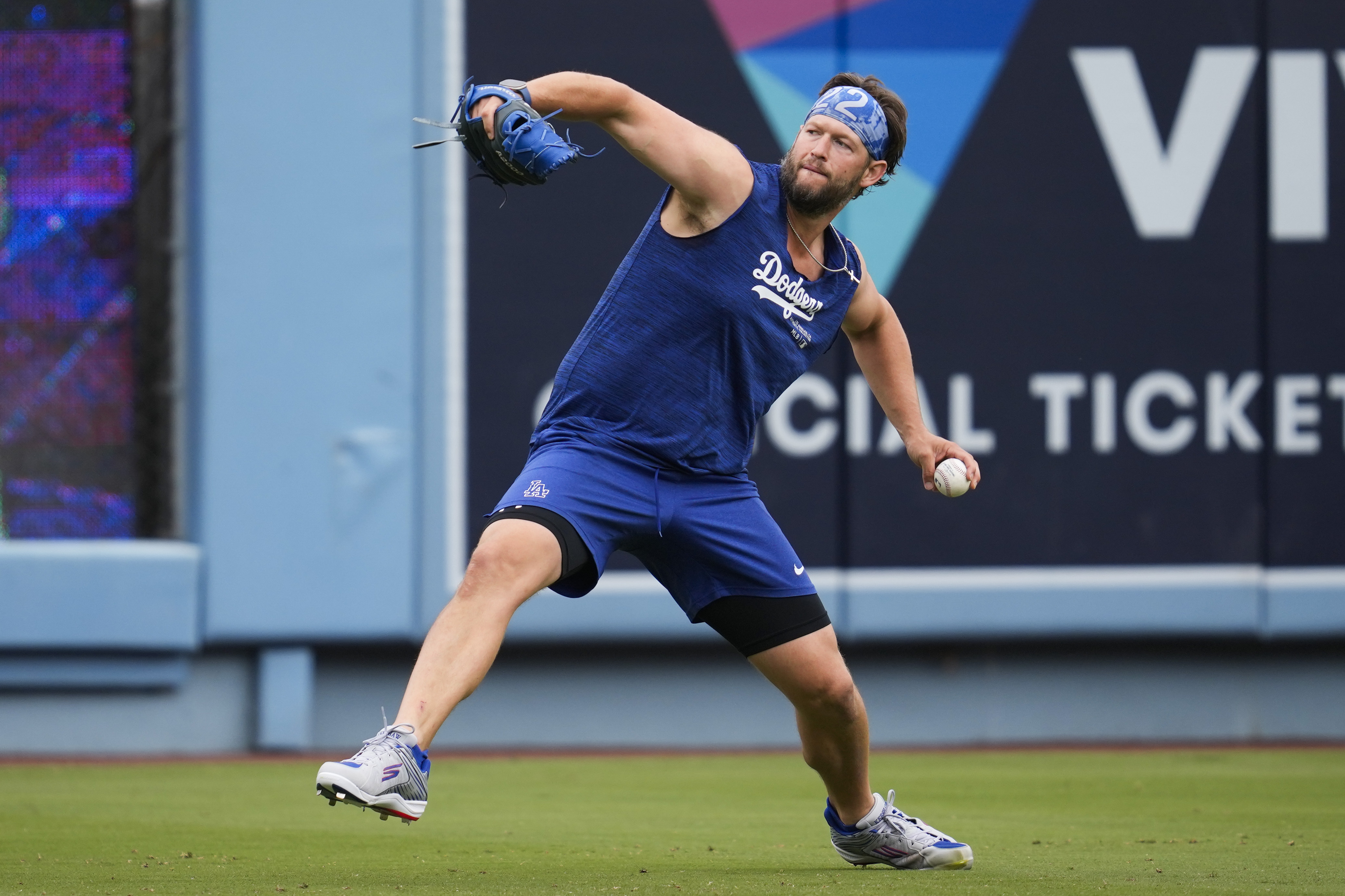 The Dodgers' Clayton Kershaw works out before a baseball game against the Colorado Rockies.