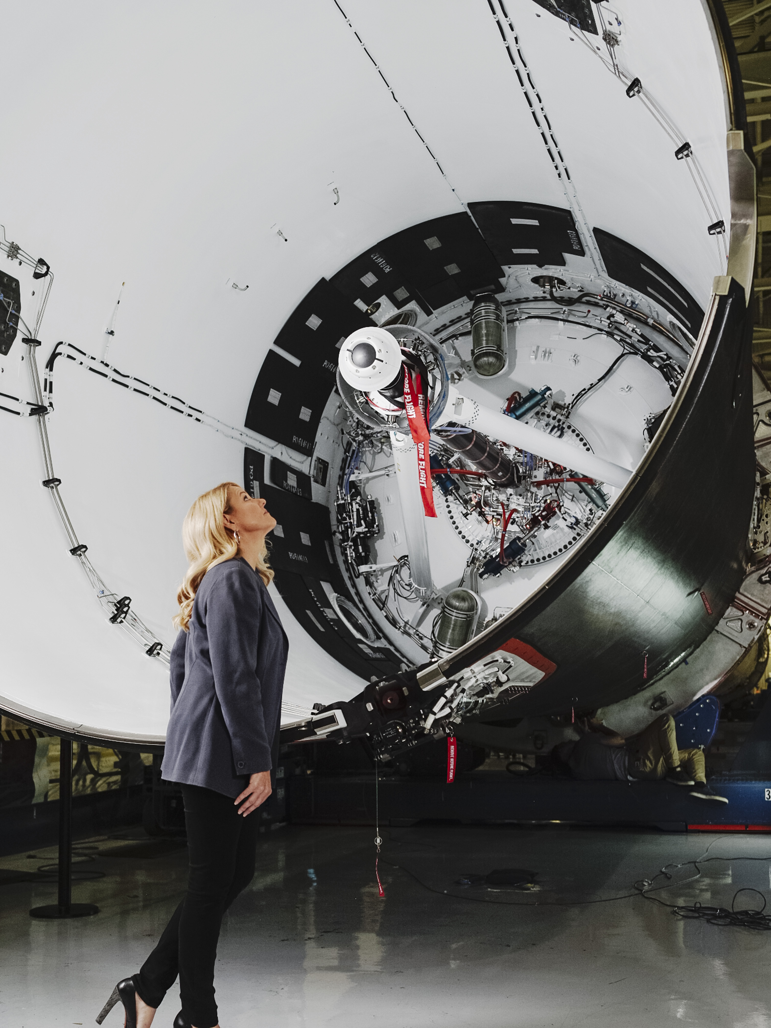 Gwynne Shotwell looks over the manufacturing of a rocket at a Space-X manufacturing facility in Los Angeles, California