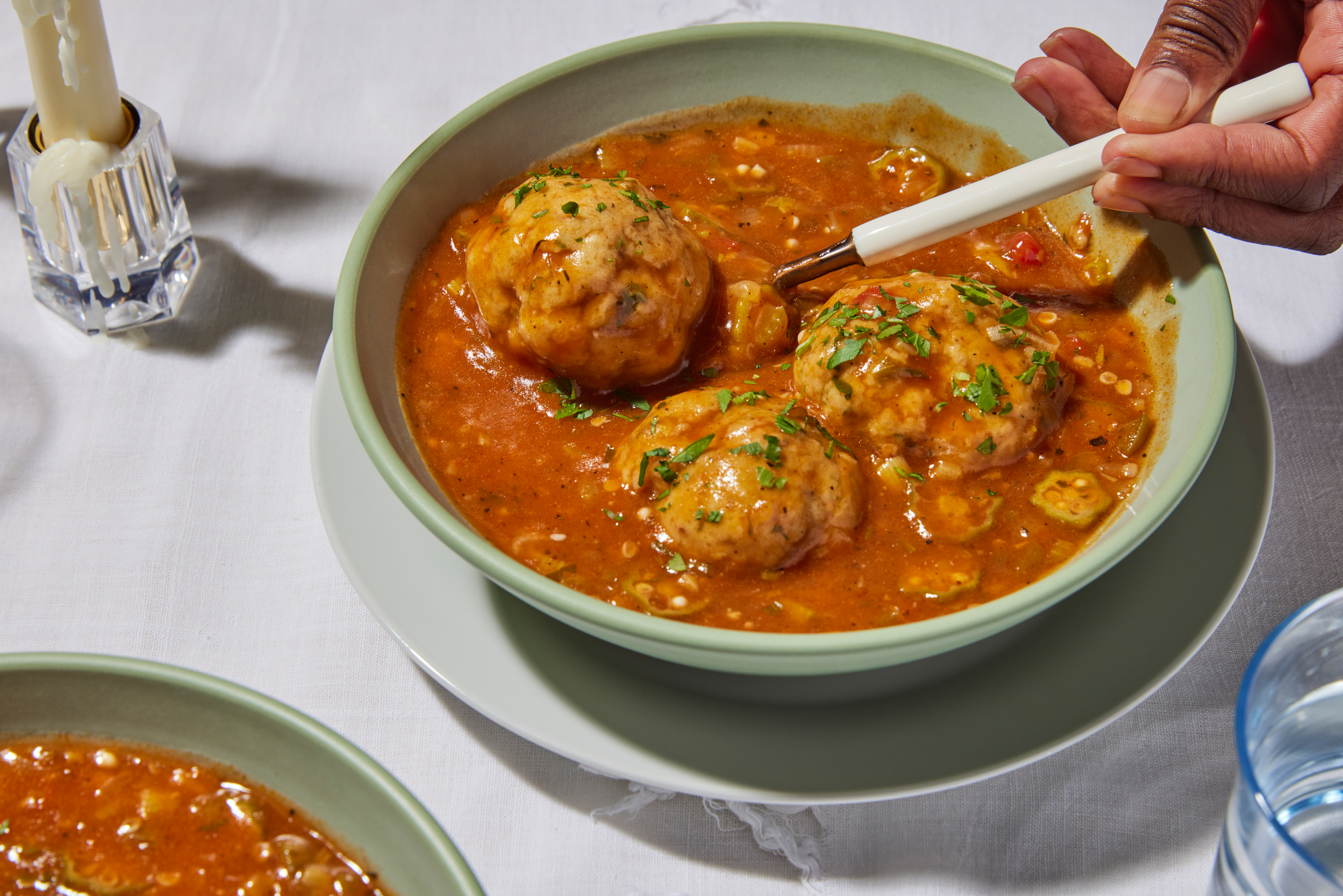 Matzoh balls serve as the starch in Michael Twitty's okra gumbo, featured in his "KosherSoul" food memoir.