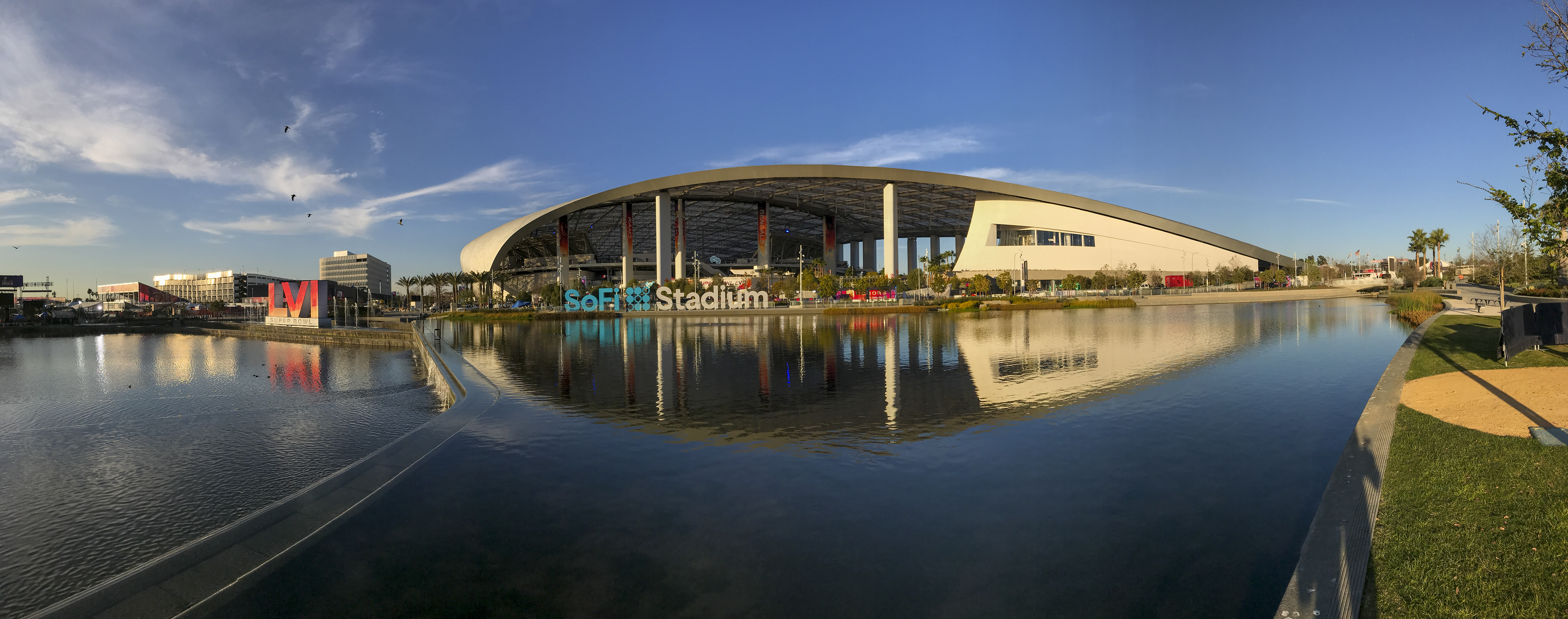 Los Angeles, CA - February 09: Workers make last minute preparations for the Super Bowl as viewed from the lake at SoFi Stadium in Los Angeles Wednesday, Feb. 9, 2022. (Allen J. Schaben / Los Angeles Times)