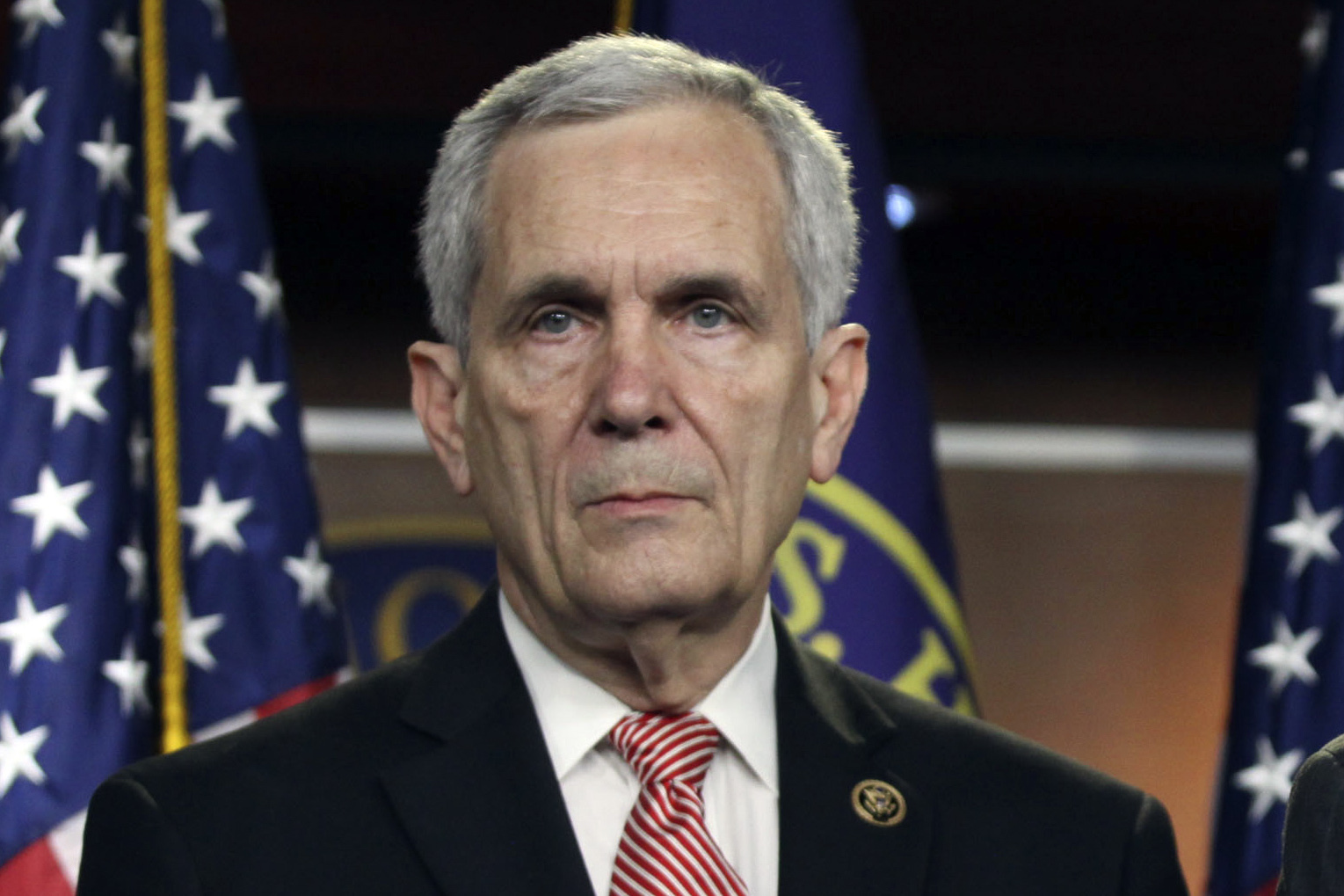 FI"LE - Rep. Lloyd Doggett, D-Texas, listens during a news conference on Capitol Hill in Washington, June 16, 2015. Doggett has become the first in the party to publicly call for President Joe Biden to step down as the Democratic nominee for president, citing Biden's debate performance failing to "effectively defend his many accomplishments." (AP Photo/Lauren Victoria Burke, File)