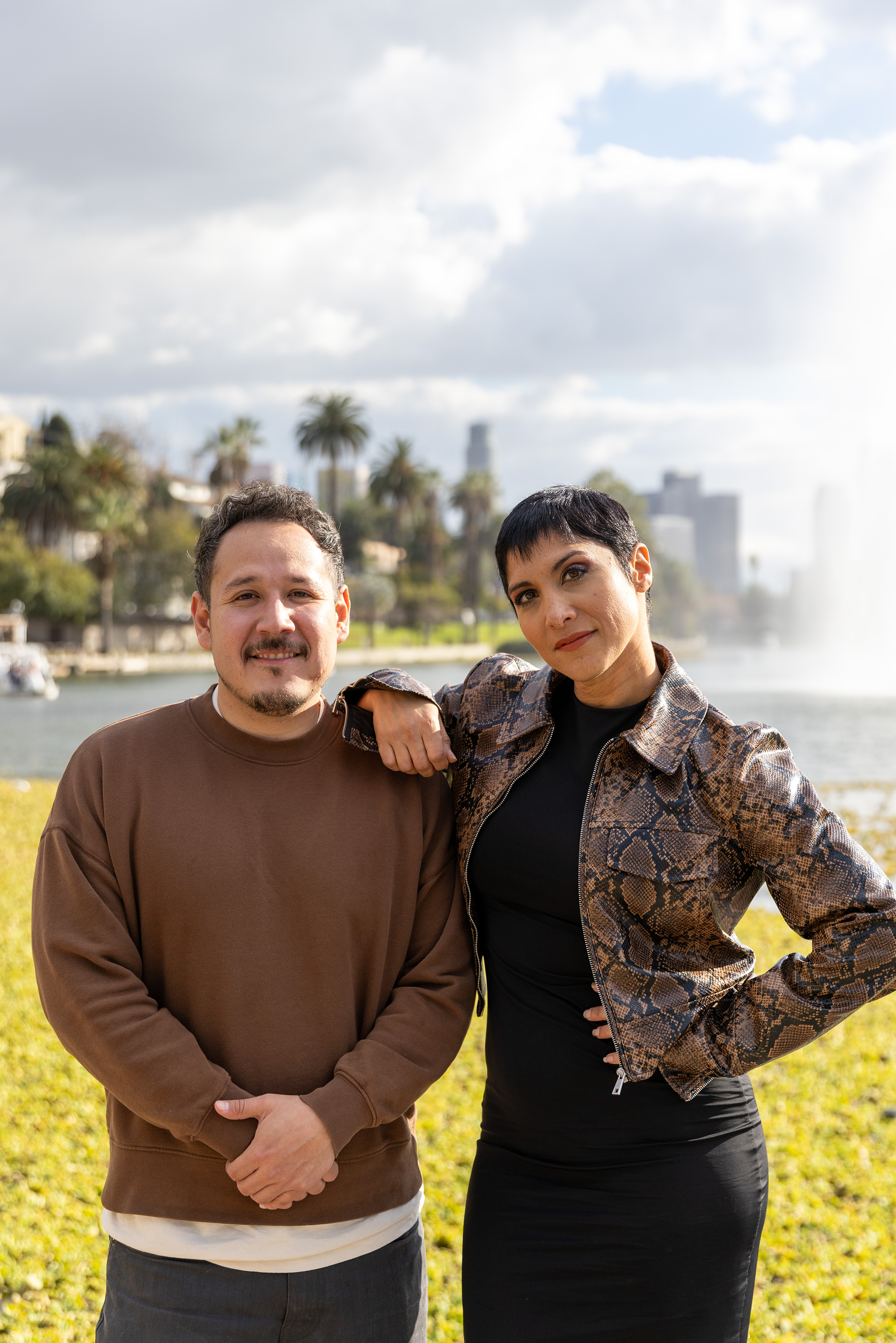 Sergio Lira and Lynette Coll pose for photos at Echo Park Lake on Friday, Feb. 9, 2024.