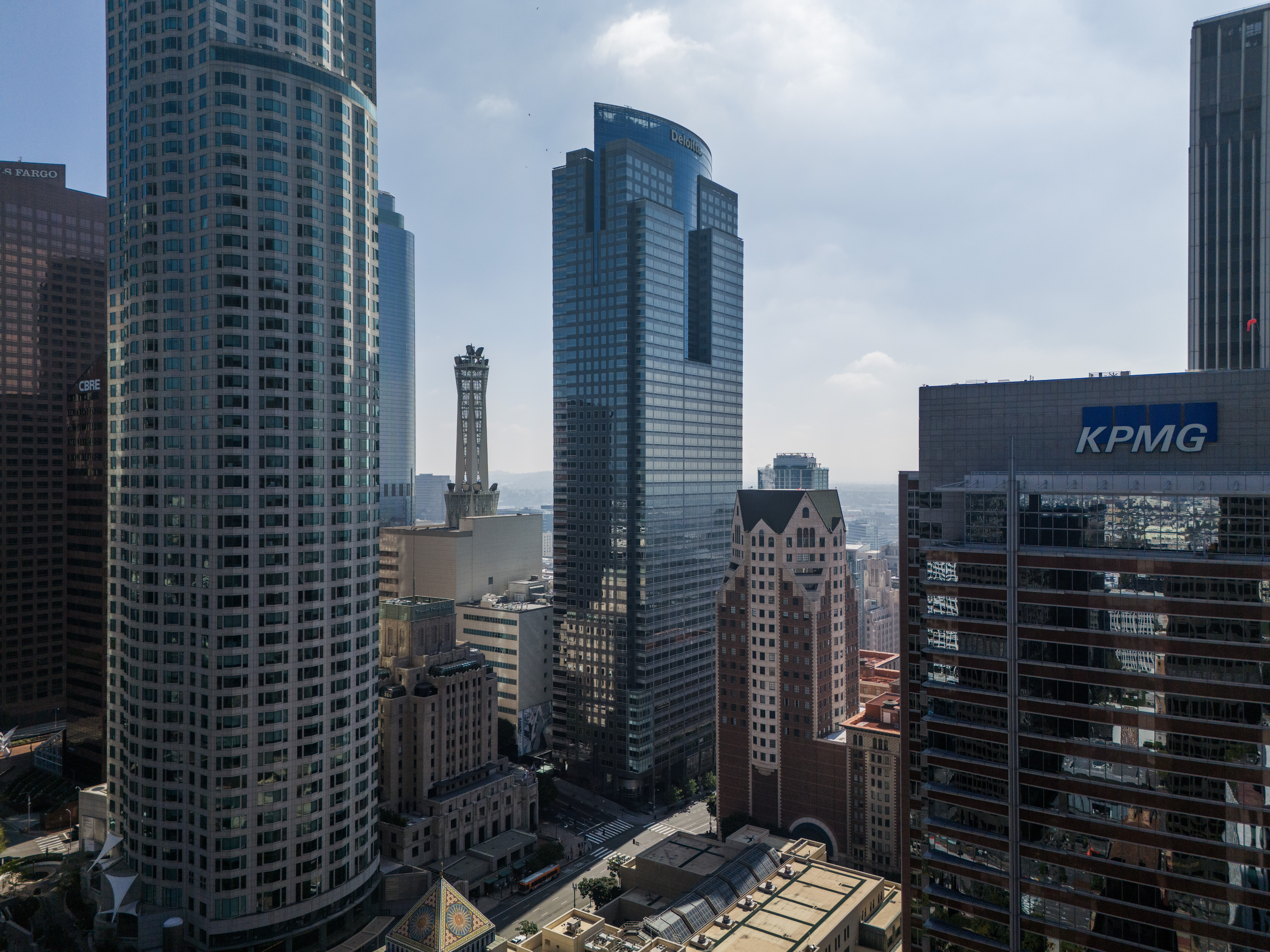 LOS ANGELES, CA- MARCH 28: The Gas Company Tower (center) in downtown, Los Angeles, CA, is facing foreclosure a year after the owner, an affiliate of Brookfield Asset Management Ltd., walked away from the building. A notice of trustee's sale for the building was filed March 21 with the Los Angeles County Recorder's office, setting the stage for a foreclosure sale as soon as 90 days after the filing. Photographed on Thursday, March 28, 2024. (Myung J. Chun / Los Angeles Times)