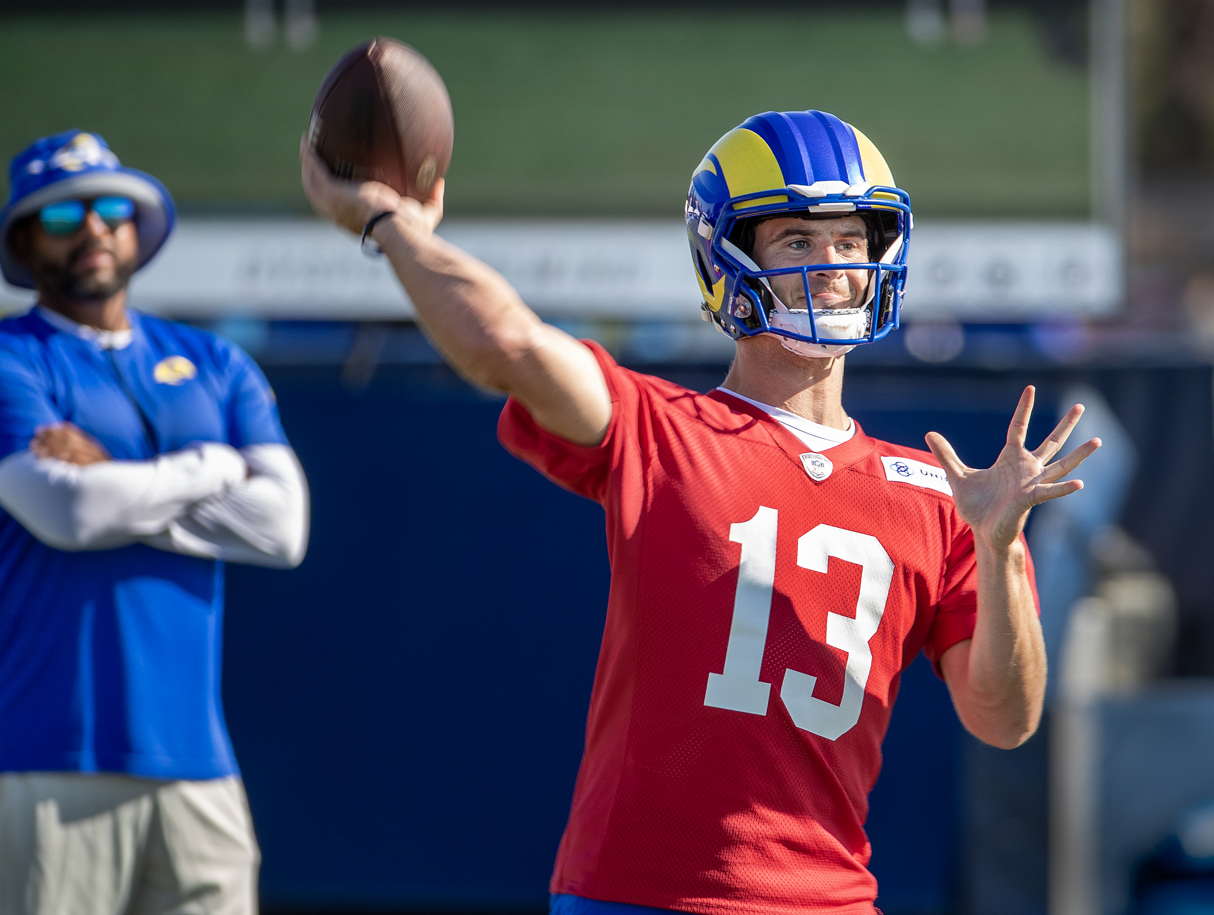 Irvine, CA - July 27: Rams quarterback Stetson Bennett passes the ball during Rams training camp.