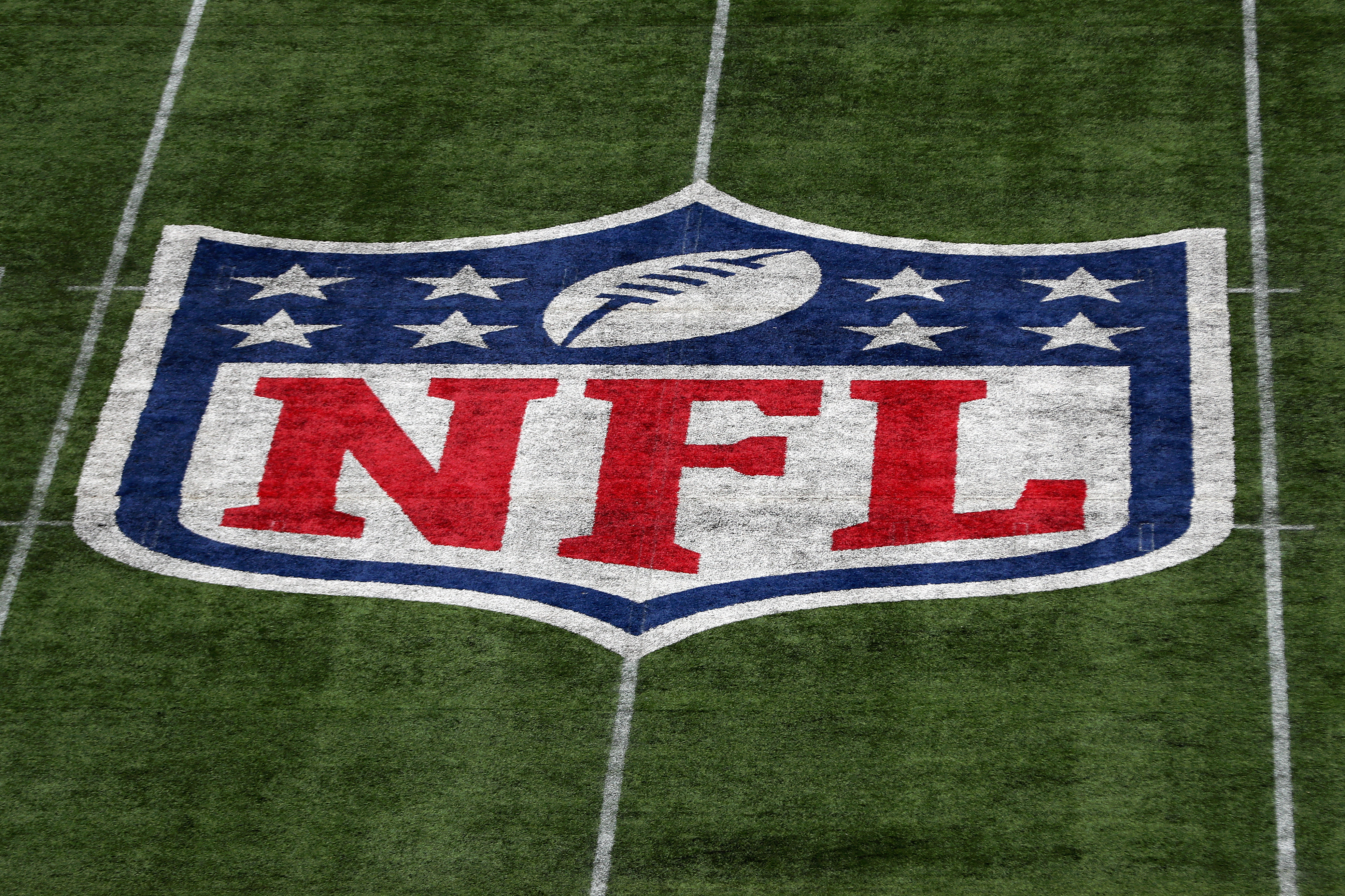 LONDON, ENGLAND - OCTOBER 13: A detailed view of the NFL logo on the field.