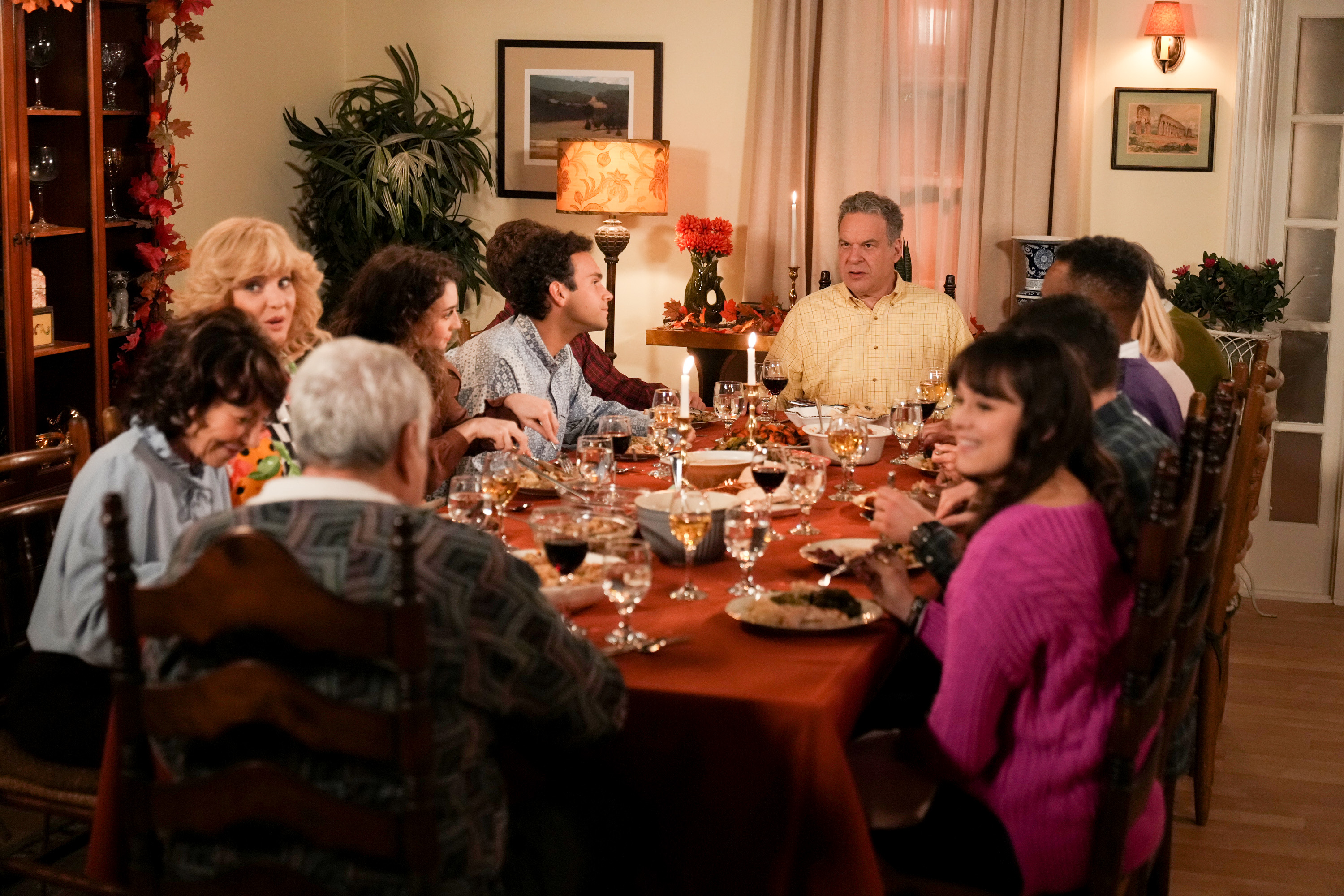  A family sitting around a table for a meal