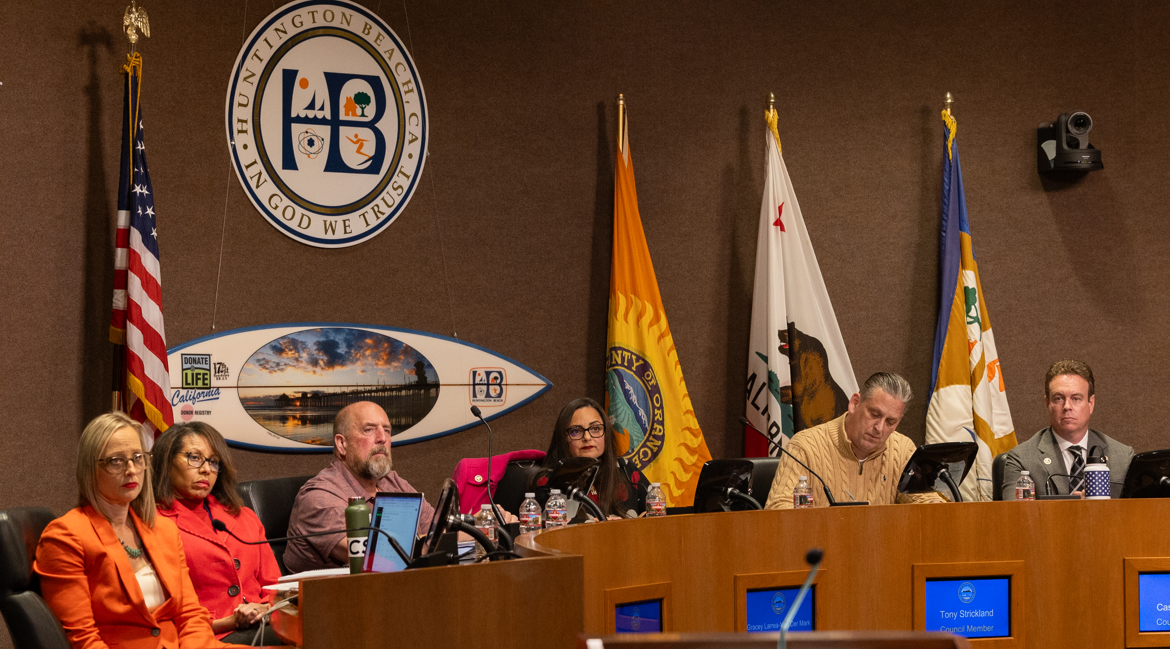 Huntington Beach, CA - January 16: Huntington Beach city council members from left: council member Natalie Moser, council member Rhonda Bolton, council member Pat Burns, Mayor Grace Van Der Mark, council member Tony Strickland, council member Casey McKeon, listen to speakers from Protect Huntington Beach, a group of concerned residents of Huntington Beach who want to increase residents' awareness of proposed charter changes during a Huntington Beach City Council meeting in Huntington Beach City Hall Tuesday, Jan. 16, 2024. (Allen J. Schaben / Los Angeles Times)