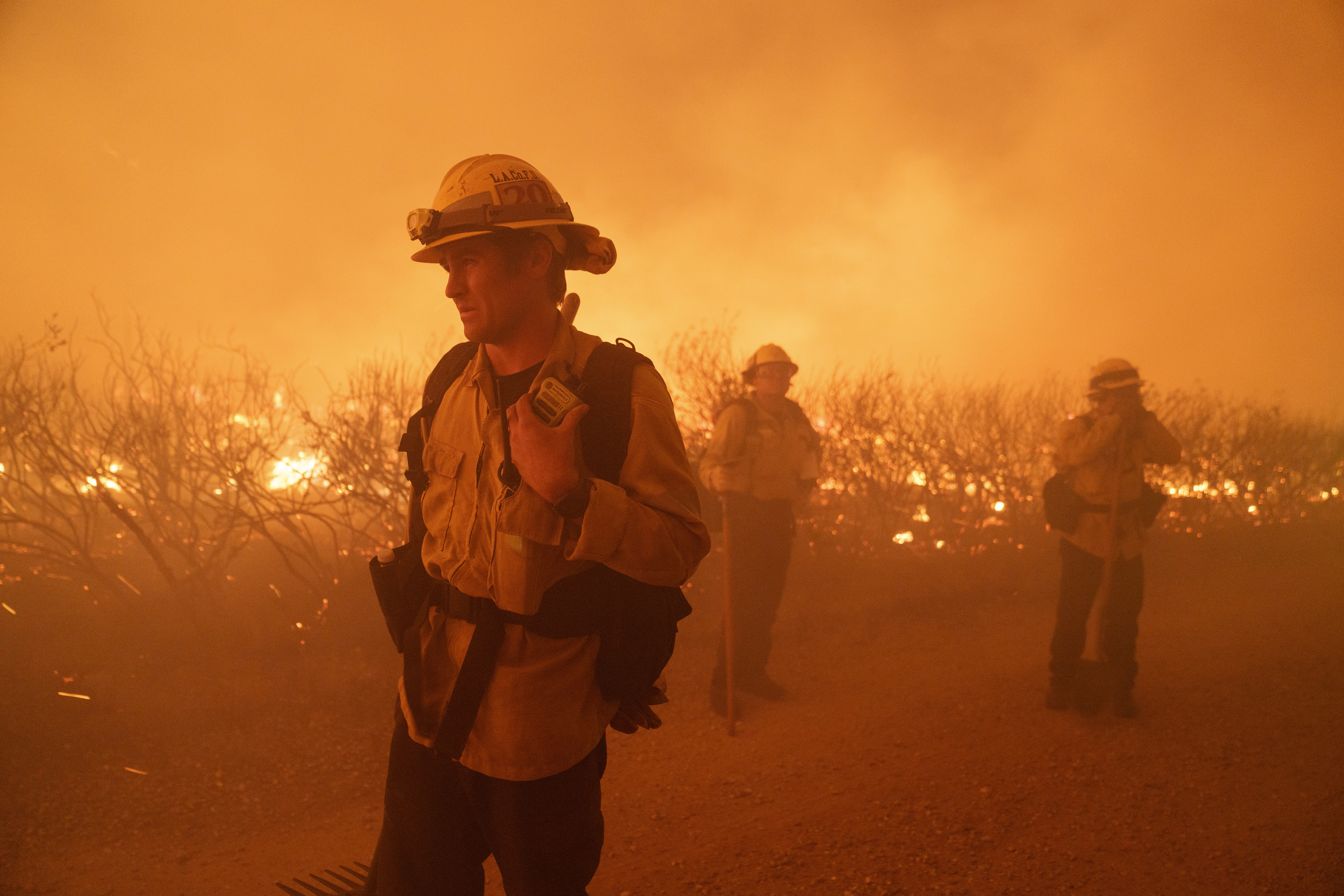 Firefighters work against the advancing Post Fire on Sunday, June 16, 2024, in Gorman, Calif. (AP Photo/Eric Thayer)