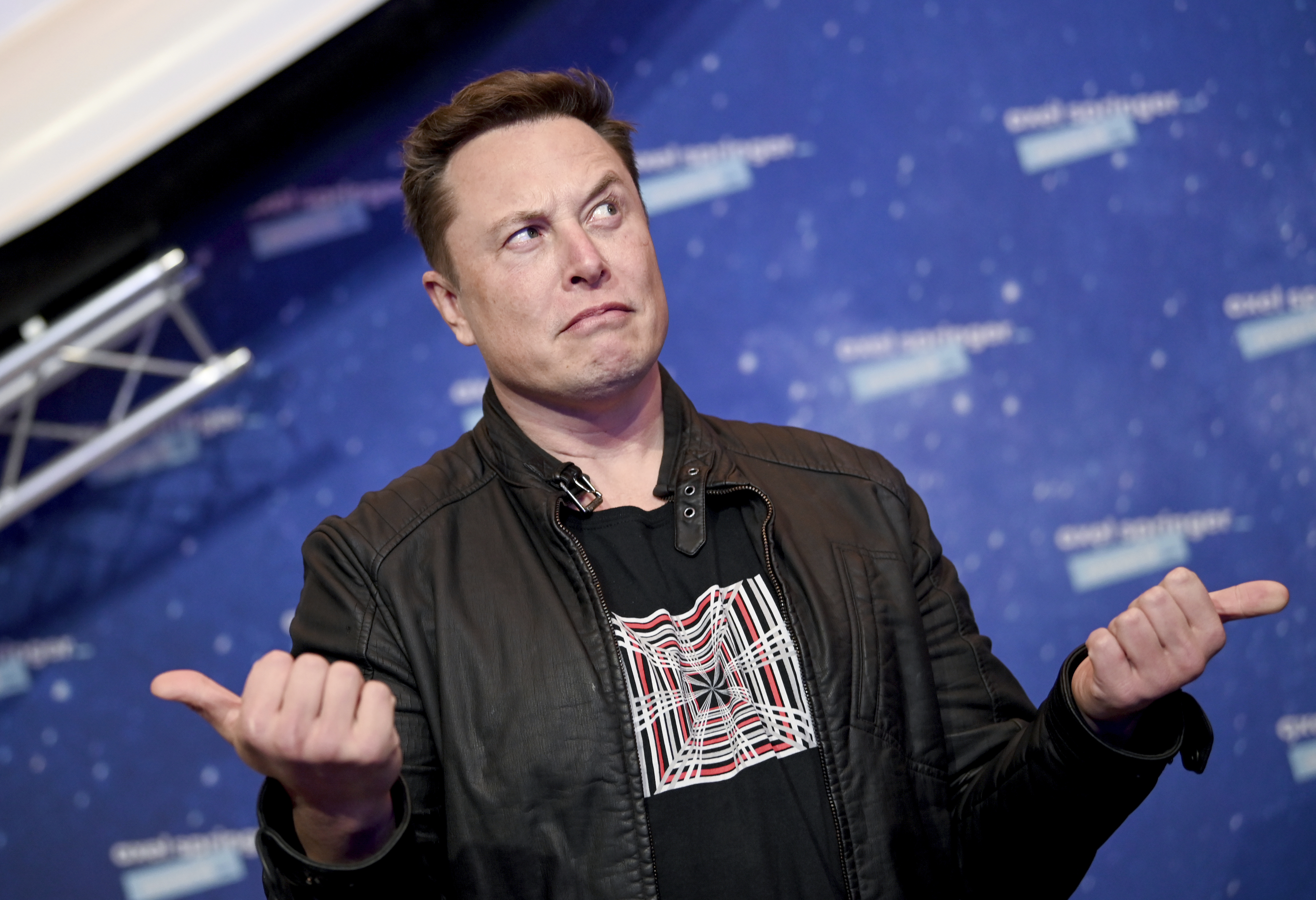 SpaceX owner and Tesla CEO Elon Musk arrives on the red carpet for the Axel Springer media award, in Berlin, Germany, Tuesday, Dec. 1, 2020. (Britta Pedersen/Pool via AP)