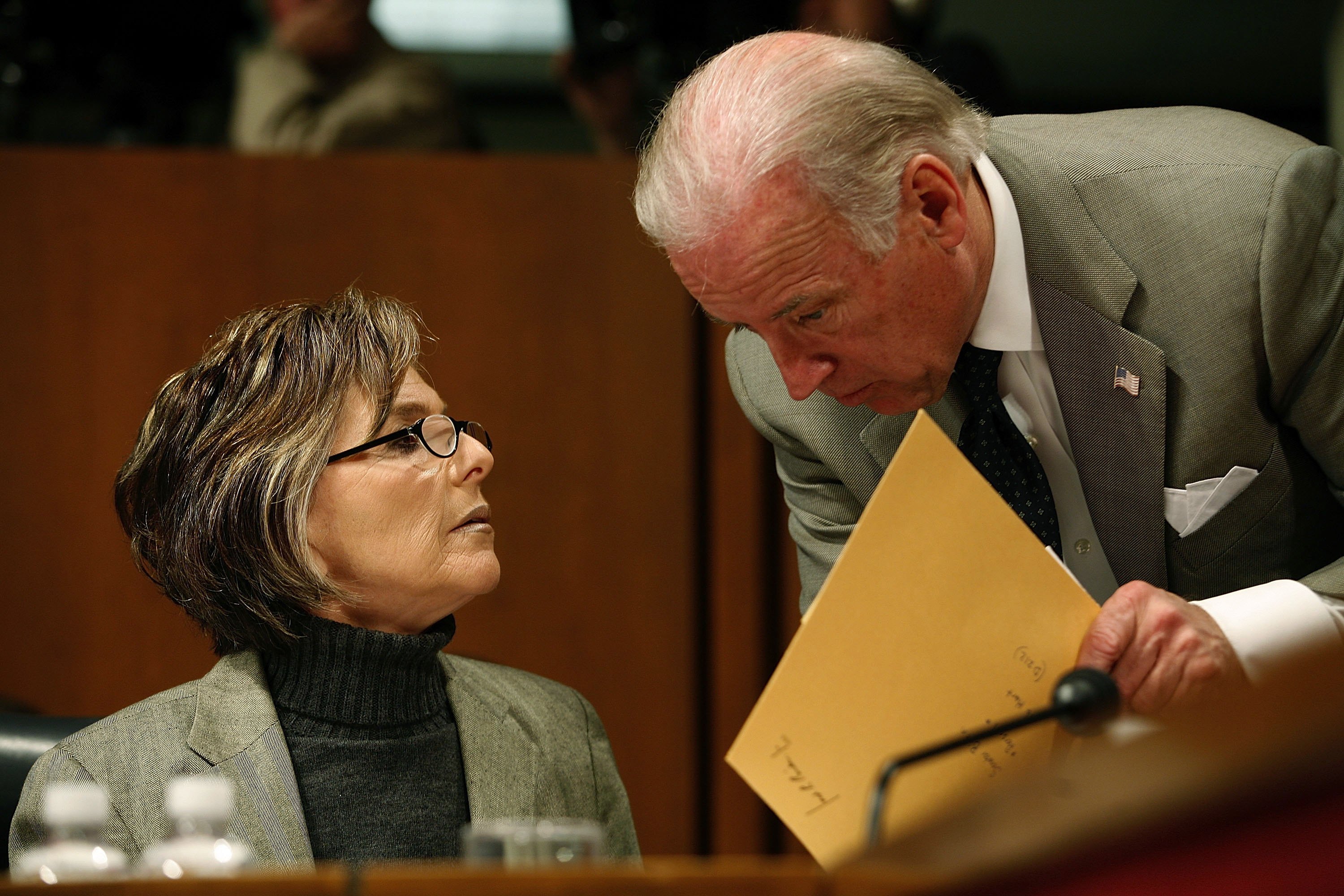 WASHINGTON - APRIL 05: Senate Foreign Relations Committee member U.S. Sen. Barbara Boxer (D-CA) and Ranking Member U.S. Sen. Joseph Biden (D-CT) speak quietly during the testimony of Secretary of State Condoleezza Rice before a full committee hearing on Capitol Hill April 5, 2006 in Washington, DC. U.S. Secretary of State Condoleezza Rice answered questions about the recent civilian nuclear cooperation deal struck between the U.S. and India during the hearing titled "U.S.-India Atomic Energy Cooperation: The Indian Separation Plan and the Administration's Legislative Proposal." (Photo by Chip Somodevilla/Getty Images)