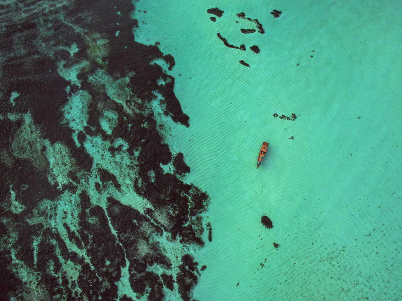 Karoso lagoon with boat