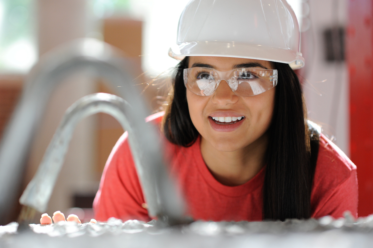 woman wearing hard hat