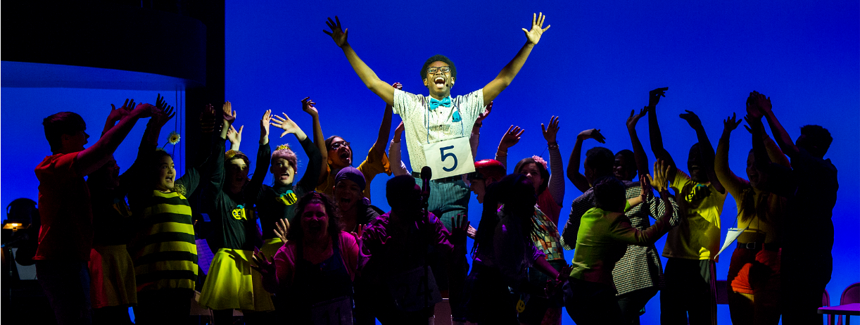 Students performing on stage