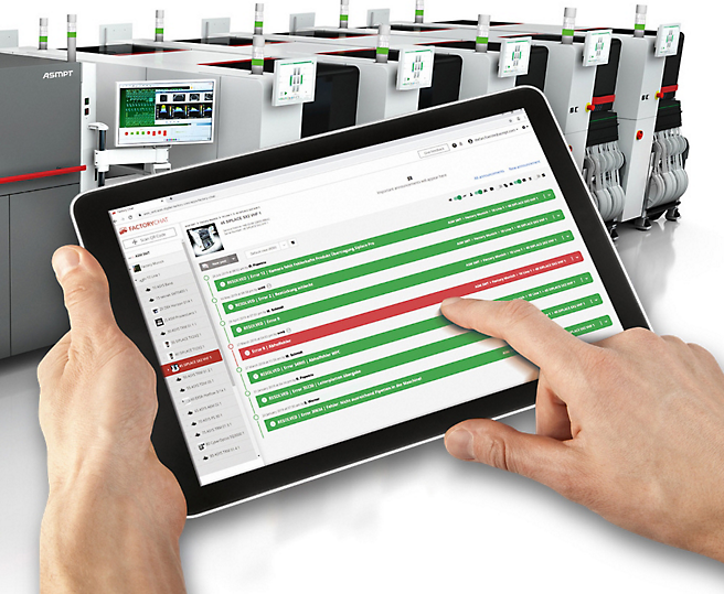 Pessoa que utiliza um tablet para monitorizar e controlar máquinas industriais.