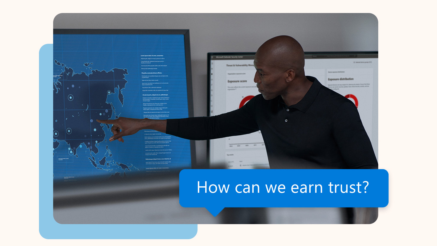 A man points to a digital world map on a screen, with the question "How can we earn trust?" displayed.