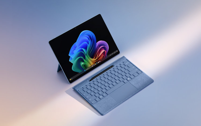 A sapphire Surface Pro tablet with a Surface Pro Flex Keyboard and Slim Pen.