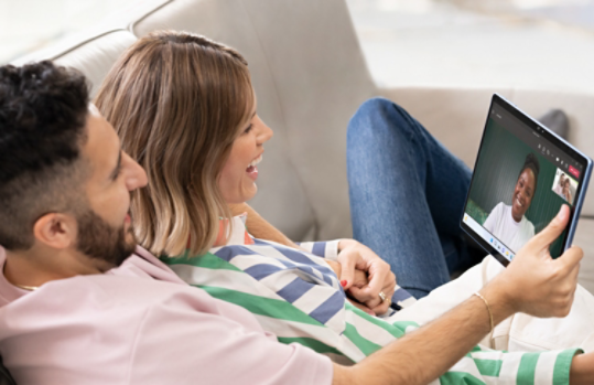 A couple using a Surface Pro on a video call