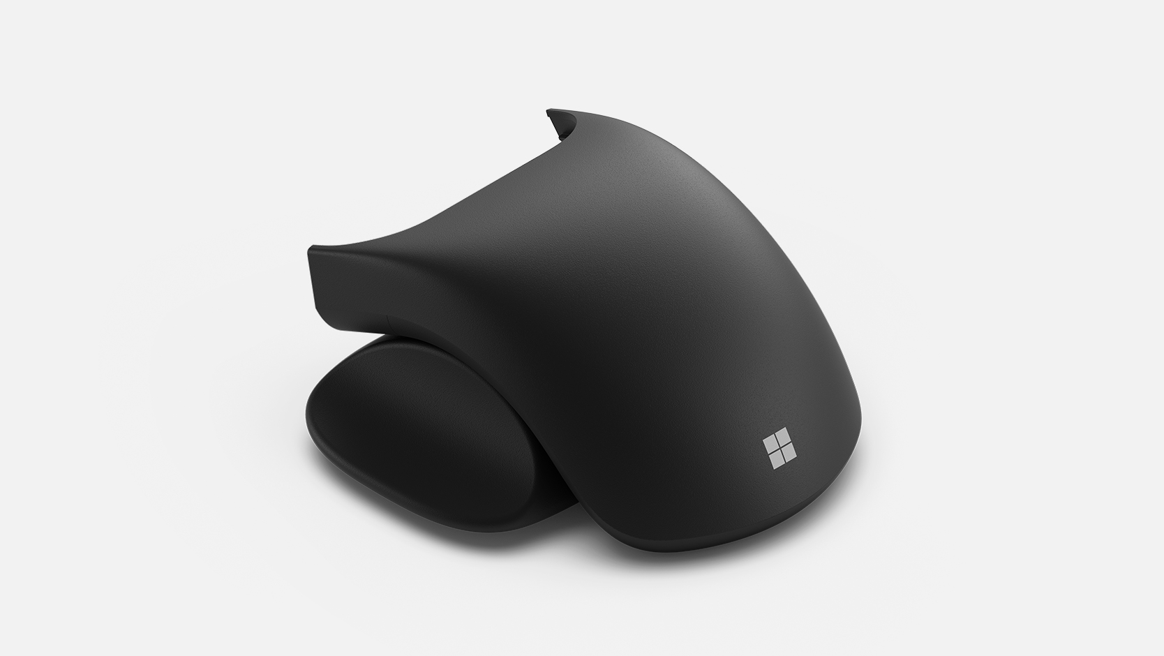 Hahmonnus Microsoft Adaptive Mouse -hiiren takaosasta ja peukalotuesta
