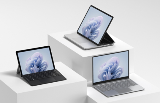 Four Surface devices are observed on plinths of various heights