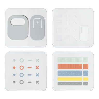 Pieces of the Microsoft Adaptive Kit are shown including cord markers, key markers and lid opener.