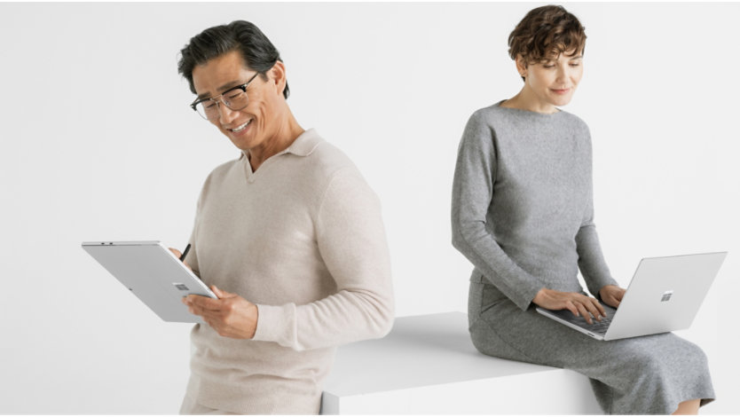 Man and woman working with Surface Pro 10 in different device configurations of tablet and laptop