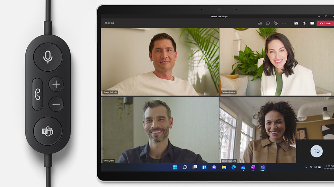 A render of a Microsoft Modern USB Headset controller and a Surface device showing a Microsoft Teams meeting in tablet mode