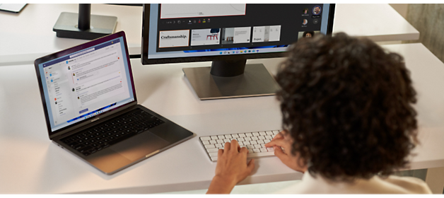 A person typing on a keyboard