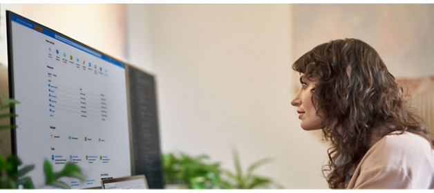 A person looking at a computer screen