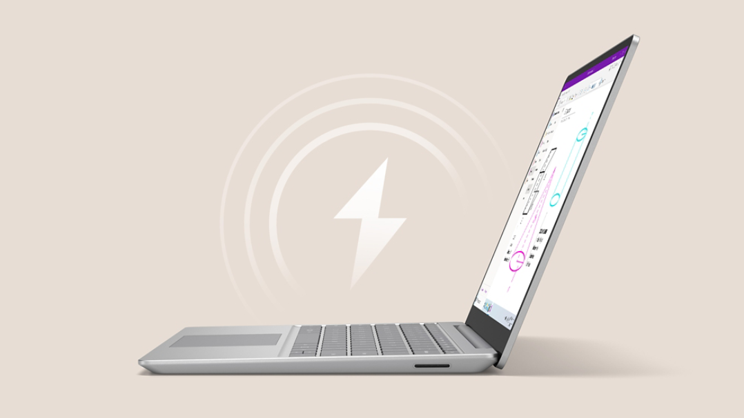 Side view of platinum Surface Laptop Go 3 with OneNote on screen and a charging icon floating above the device.