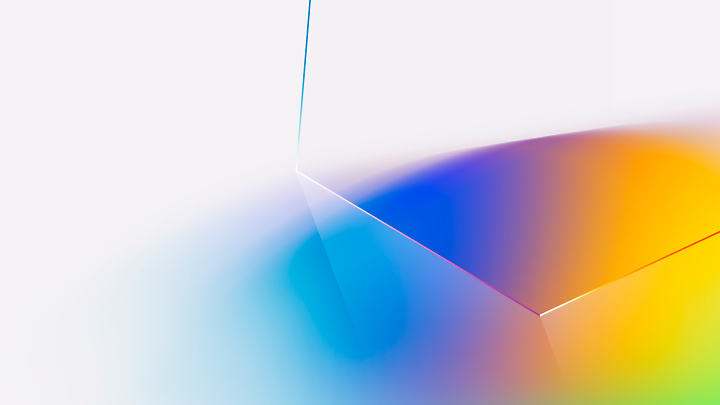 抽象影像，顯示反射面的一角，其中藍色和橙色的漸層顏色融入白色背景中。