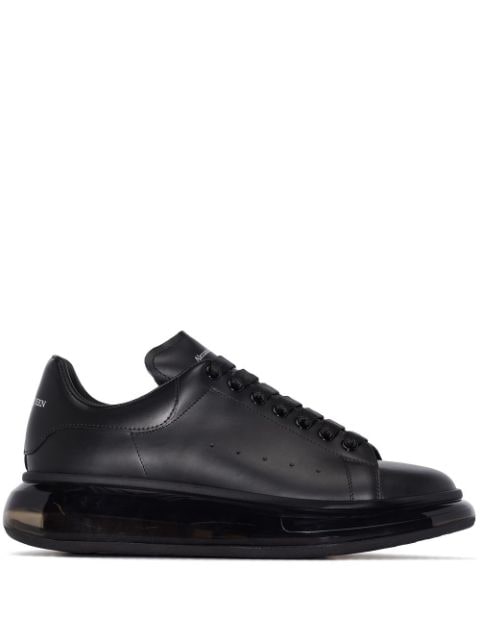 Alexander McQueen tenis mid-top con suela transparente