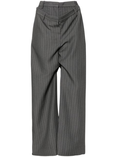 Acne Studios pantalones con rayas diplomáticas estampadas