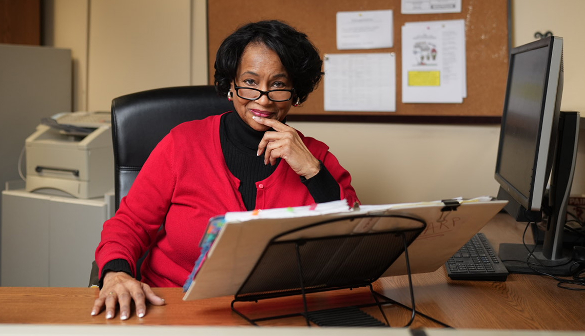 AARP Fraud Watch Volunteer LeDene Lewis poses for a portrait at Civic Park Senior Center in Livonia, Mich. on April 6, 2023.