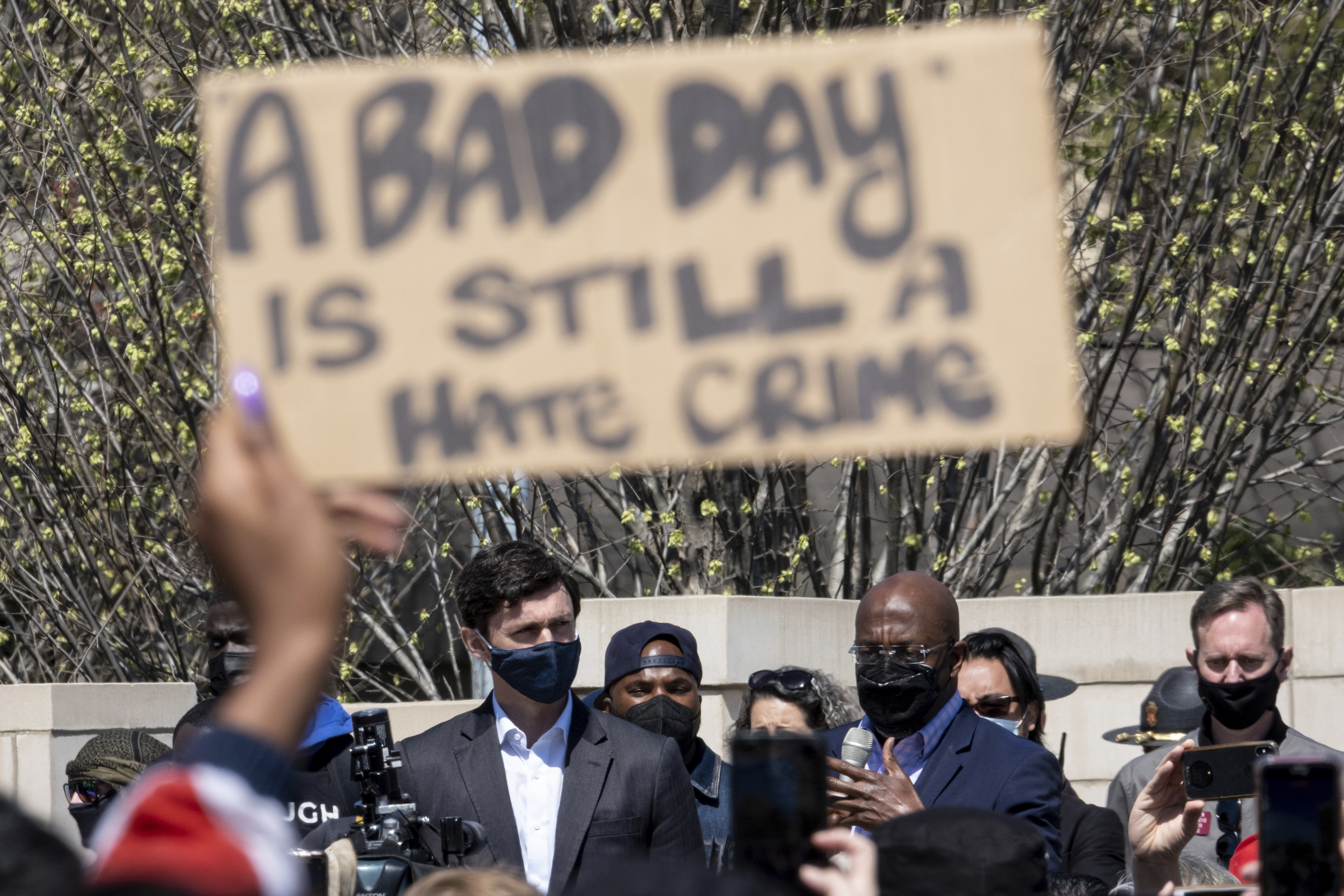 U.S. Sens. Jon Ossoff, D-Ga., and Raphael Warnock, D-Ga., speak during a "stop Asian hate" rally outside the Georgia State Capitol in Atlanta on Saturday afternoon, March 20, 2021.