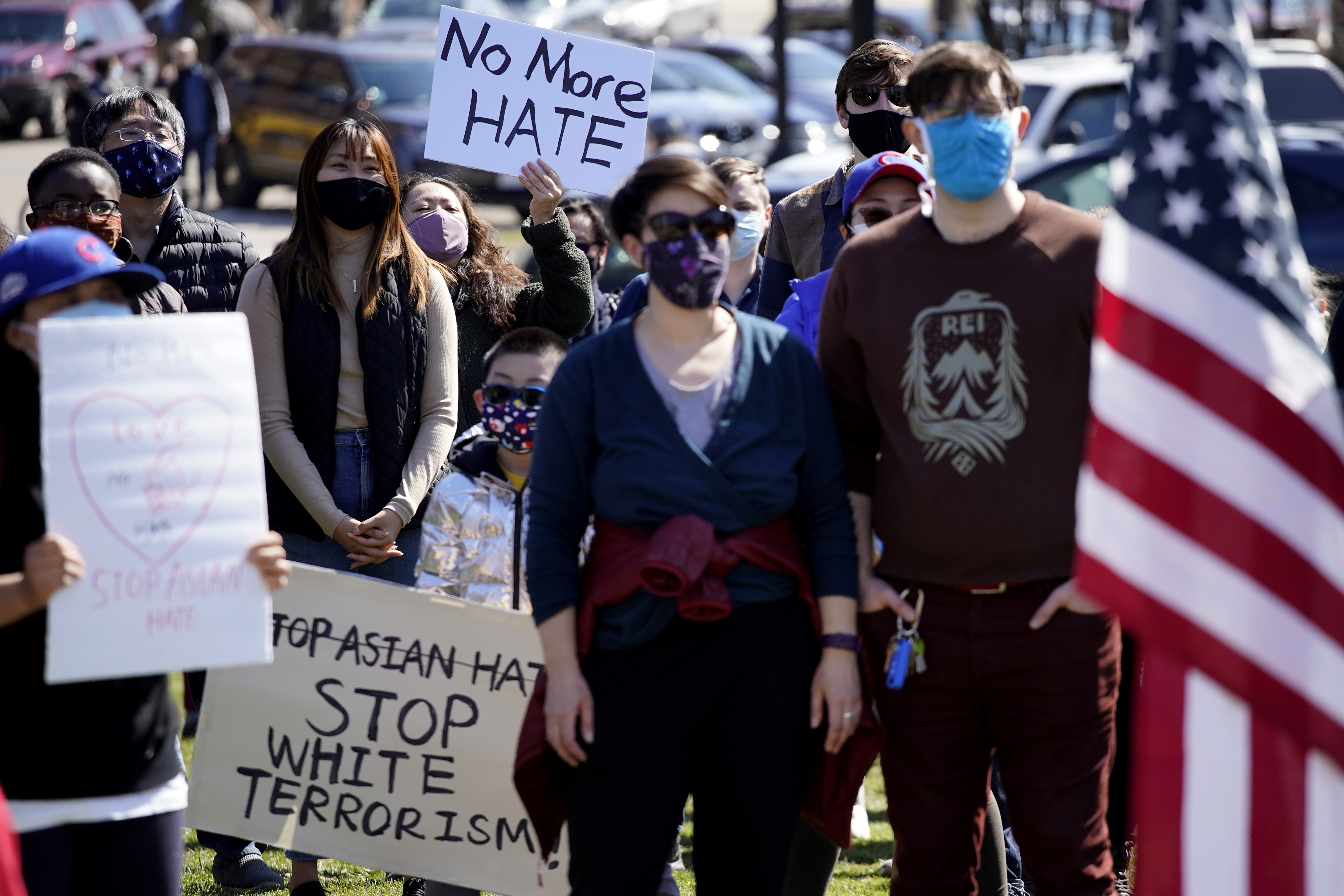 People attend a rally to support Stop Asian Hate at the Logan Square Monument in Chicago, Saturday, March 20, 2021.