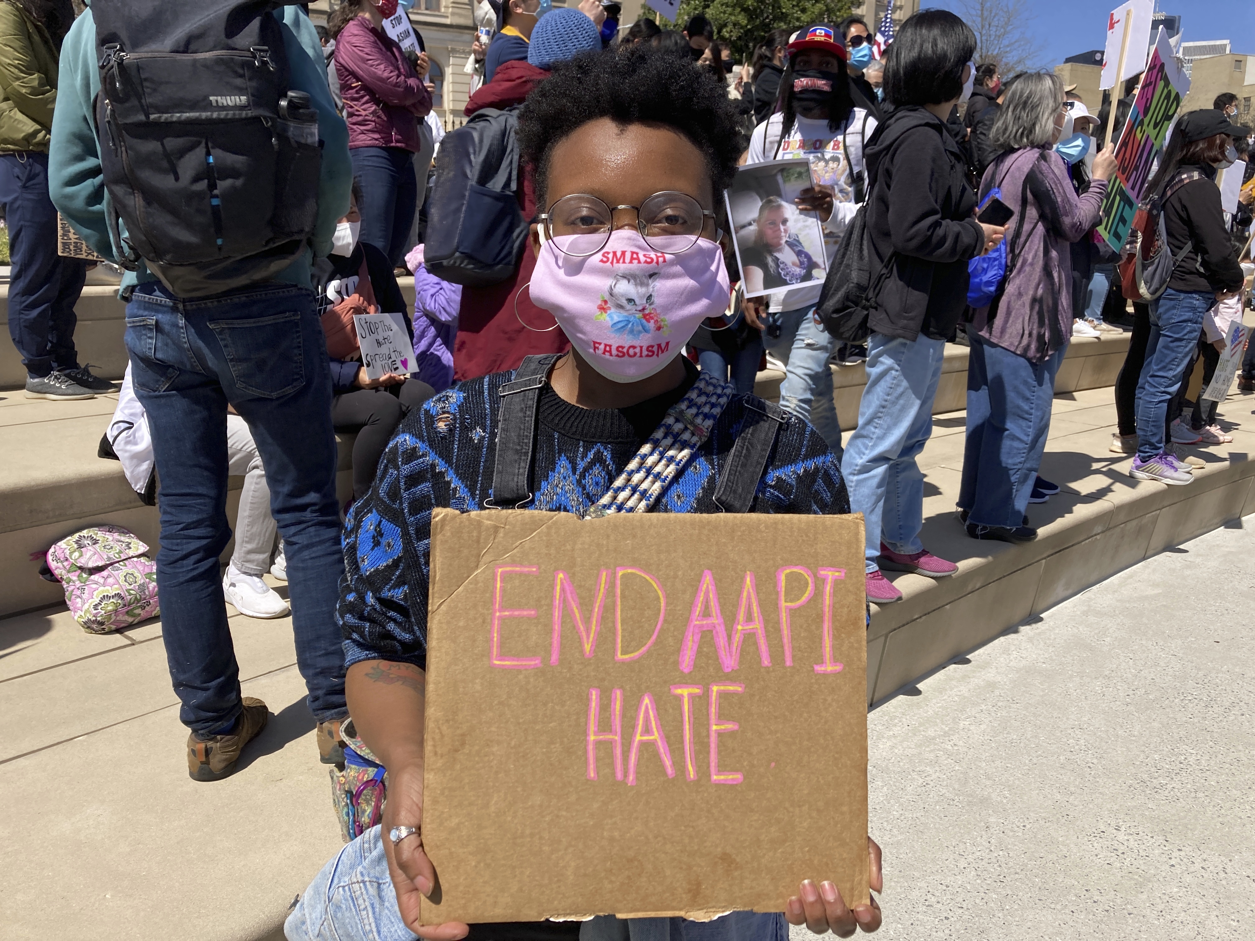 Camden Hunt poses for a picture at a rally on Saturday, March 20, 2021, across from the Georgia state Capitol in Atlanta.