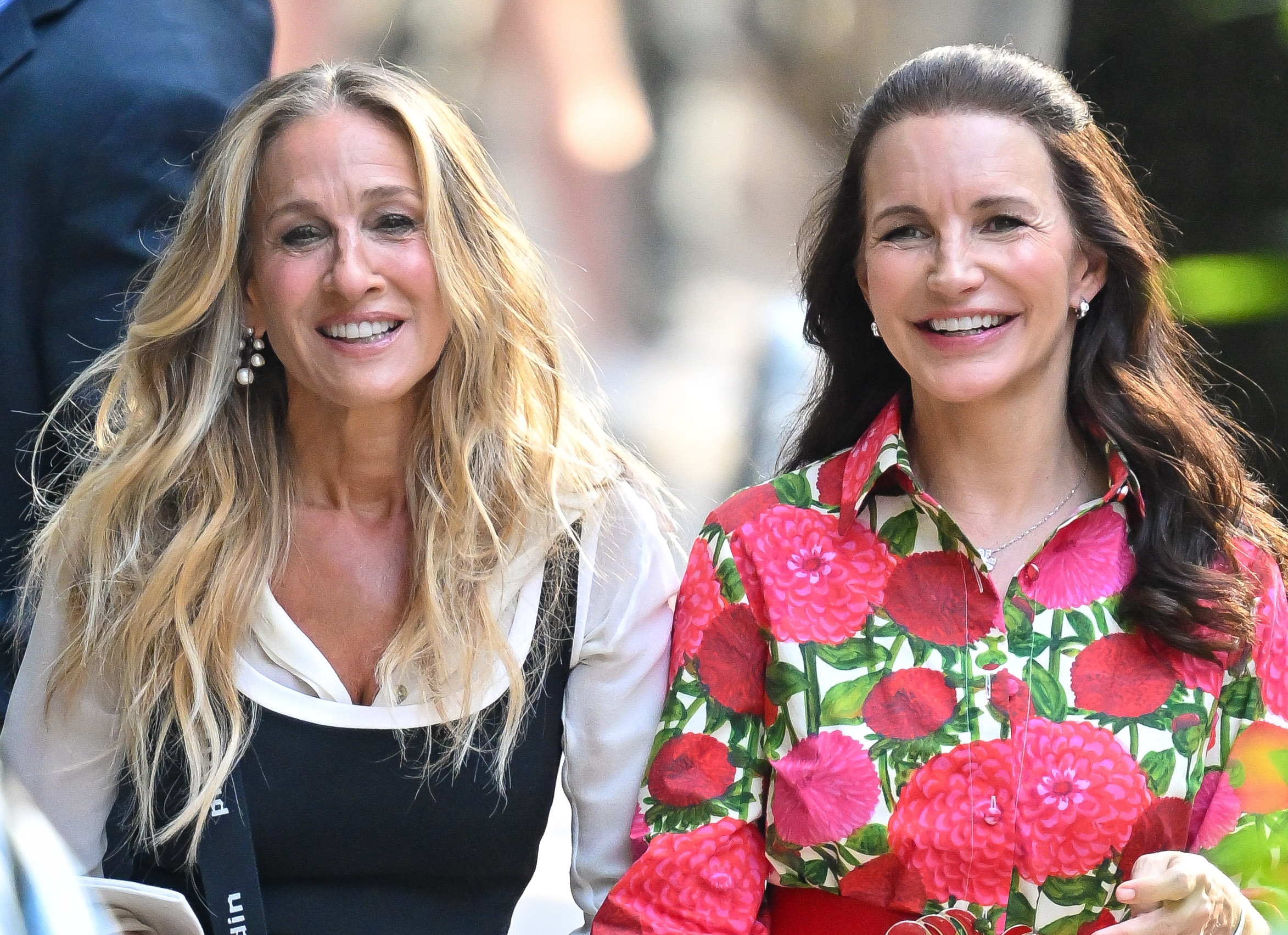 Sarah Jessica Parker and Kristin Davis on the set of "And Just Like That..." in SoHo on June 25, 2024, in New York City. | Source: Getty Images