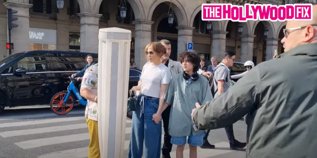 Jennifer Lopez and Emme Muñiz walk with security in Paris, France, as seen in a video dated May 12, 2024. | Source: YouTube/TheHollywoodFix