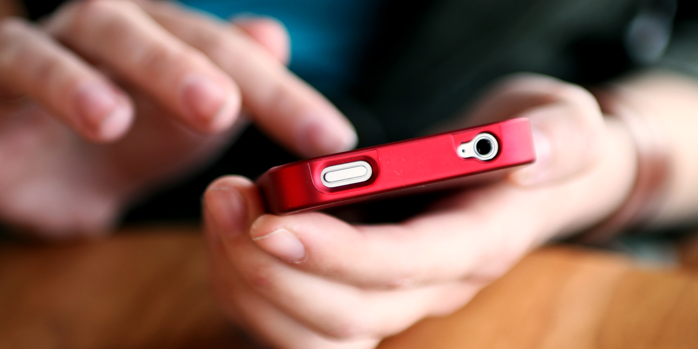 Someone using a cell phone | Source: Shutterstock