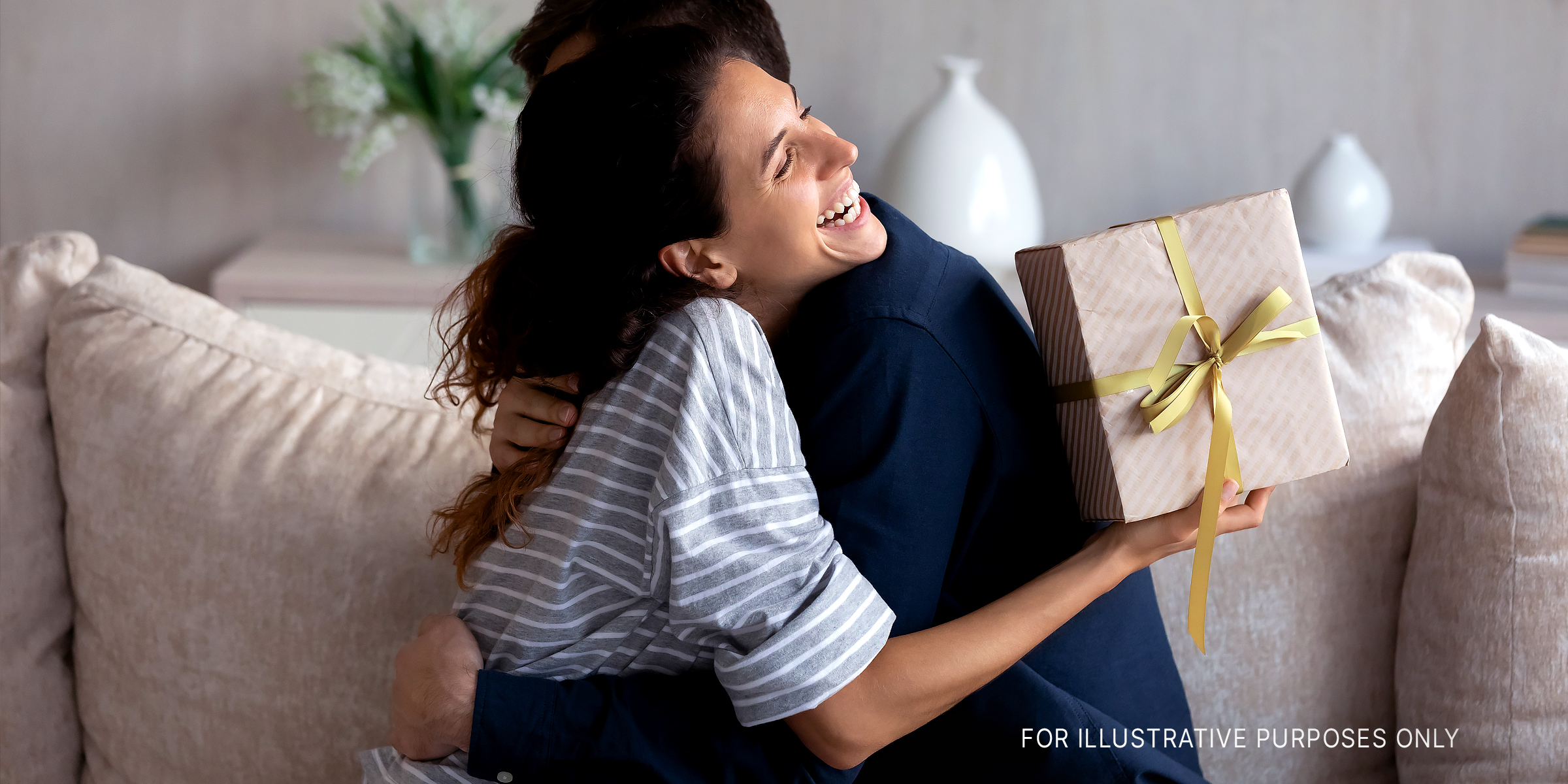 A couple hugging each other | Source: Shutterstock