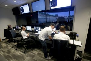 Ford engineers working at the simulator