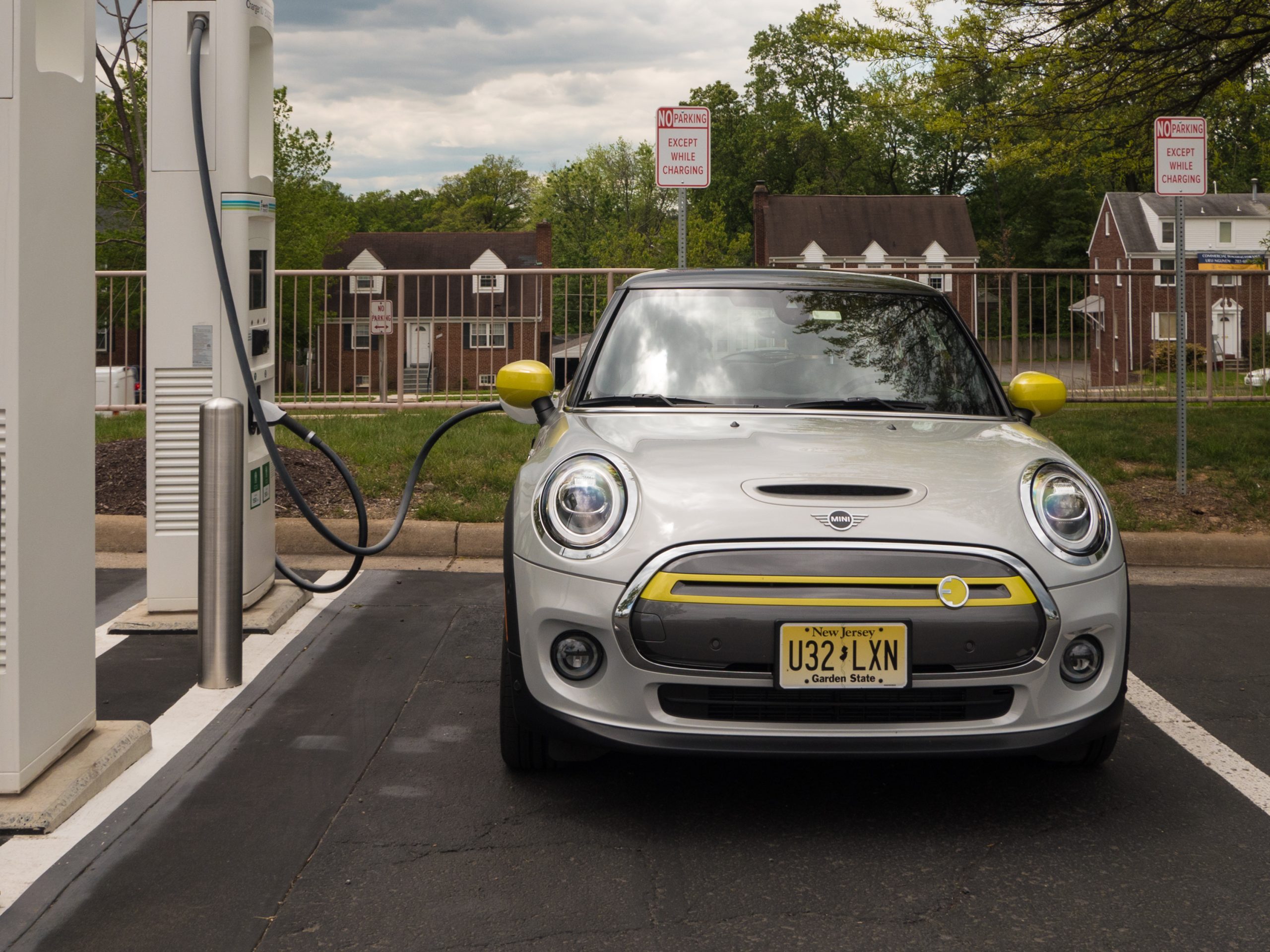 A Mini Cooper SE at a DC fast charging station