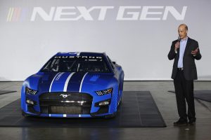 Mark Rushbrook, Ford Performance Motorsports Global Director speaks at the unveiling of the seventh generation of the NASCAR Cup Series Ford during the NASCAR Next Gen Car Announcement on May 05, 2021 in Charlotte, North Carolina