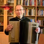 Linus Åkesson playing his homemade "Commodordion" in a YouTube video.