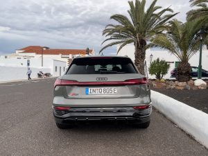 A grey Audi Q8 e-tron seen from behind