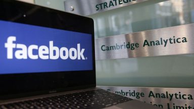 facebook logo next to cambridge analytica sigh