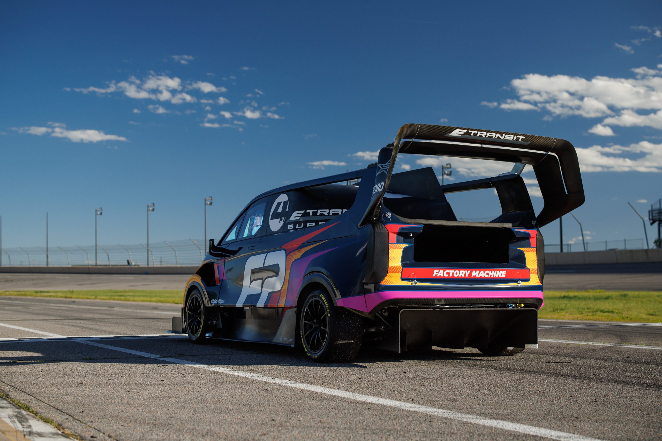 Ford's Supervan 4 from behind. The rear wing is enormous