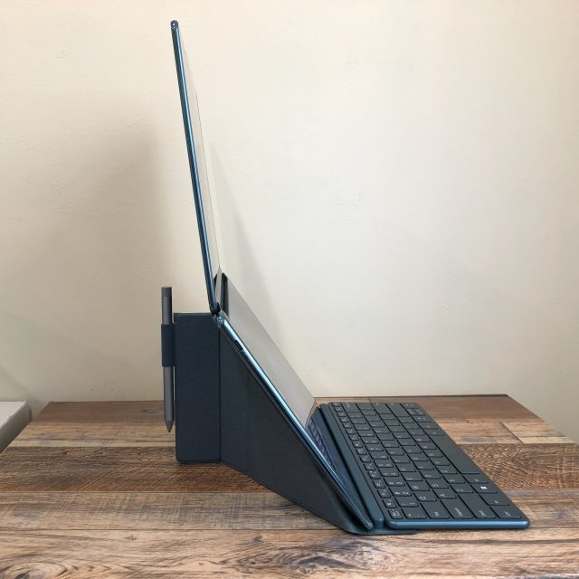 profile view of Lenovo Yoga Book 9i in double landscape mode and in its stand