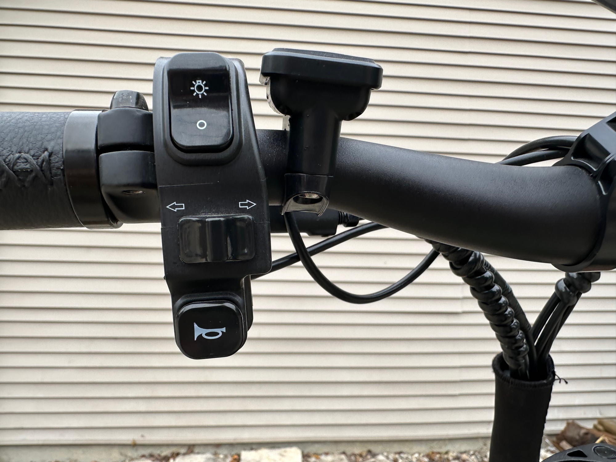 left side of handlebar