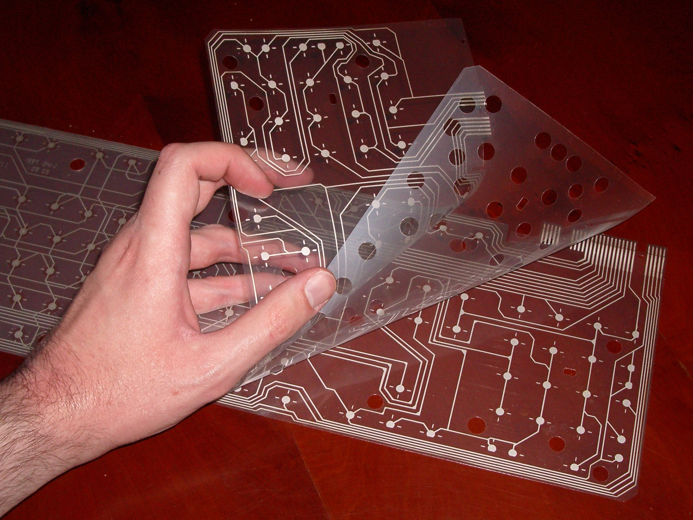 A membrane keyboard's three membrane sheets.